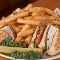 Triple Decker Turkey Club · Thinly-sliced smoked turkey breast with bacon, lettuce, tomato and mayo on white or wheat to...