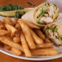 Chicken Caesar Salad Wrap · Grilled chicken breast, crisp romaine leaves tossed in our own caesar dressing with garlic c...