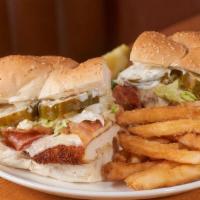 Fried Chicken Sandwich · Mustard crusted chicken breast with American cheese, bacon, pickles, lettuce and mayonnaise ...