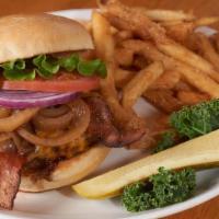 Smokehouse Bbq Burger · Smothered in our special BBQ sauce, cheddar cheese, caramelized onions and crispy bacon. Ser...