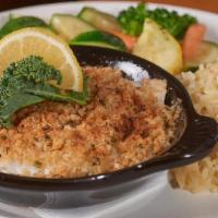 Baked Atlantic Haddock · Broiled Atlantic Haddock topped with bread crumbs and served with fresh steamed vegetables a...