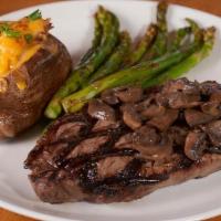 New York Strip Sirloin ~ Gluten Free · A hand-cut choice New York strip . char-grilled to perfection and topped with sautéed mushro...