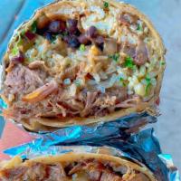 Chepe'S Burrito · Giant burrito rolled in a flour tortilla, filled with rice, beans, cheese, lettuce, pico de ...