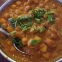 Channa Masala · Chickpeas cooked in Indian spices & gravy.