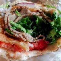 Gyros · The famous Greek yeeros (Made with Lamb & Beef)