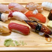  Traditional Omakase · Set comes with 12 pieces chef's choice Nigiri and a Miso soup. ( Extra chef's choice Nigiri ...