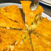 Birriapizza · With onions, cilantro, salsa, and consume