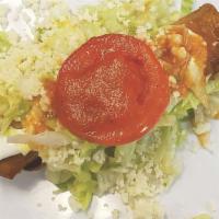 Flautas · Choice of meat, crispy rolled taquito with lettuce, cheese, and sour cream.