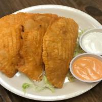 Empanadas Plate · Three empanadas with your choice of meat with cheese, chipotle mayo. With Side of Rice and B...