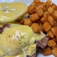 Smoked Beef Brisket Benedict · Toasted English muffins, topped with apple-wood-smoked beef brisket, . poached eggs, and del...