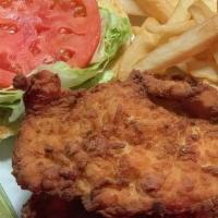 Fried Chicken Sandwich · Hand-battered fried chicken served on a roll, with lettuce, tomato, mayo, pickle spear and f...