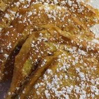 Online French Toast · Thick sliced bread dipped in fresh vanilla bean and cinnamon mix finished with powdered suga...