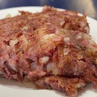 Online Side Of Corned Beef Hash · A blend of boiled beef, potato, and spices served grilled.