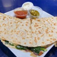 Online Veggie Quesadilla · Grilled flour tortilla pressed with grilled seasonal veggies and melted cheddar cheese insid...