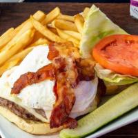 Online Breakfast Burger · Double patty, fried egg, bacon, and cheese.  Served on a bulkie roll with lettuce, tomato, m...