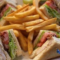Online Oven Roasted Turkey Club · Oven roasted sliced turkey, bacon, lettuce, tomato, and mayonnaise served on choice of toast...