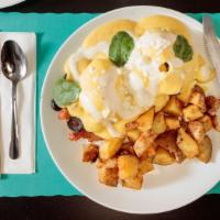 Greek Style Eggs Benedict  · Two poached eggs served over Canadian bacon, spinach, feta cheese, tomatoes, black olive, En...