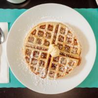 Belgium Waffle · Comes topped with butter and powdered sugar. Addons available.