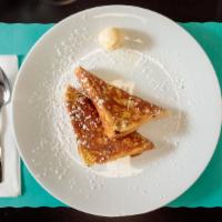 Kids One French Toast · Comes with 1 sausage or 1 bacon
Topped with butter and powder sugar