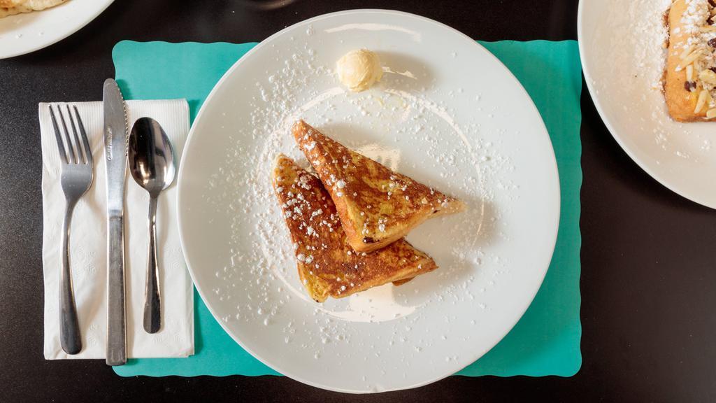 Kids One French Toast · Comes with 1 sausage or 1 bacon
Topped with butter and powder sugar