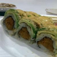 Fuji Roll · Spicy salmon inside, topped with avocado, crunch and spicy mayo sauce.