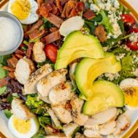 Cobb Salad · organic mix greens, bacon, blue cheese, eggs, avocado, chicken, and red wine house dressing.