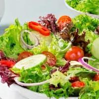 Organic Mix Green Salad · roasted pecans, cherry tomatoes, goat cheese, and lemon vinaigrette.