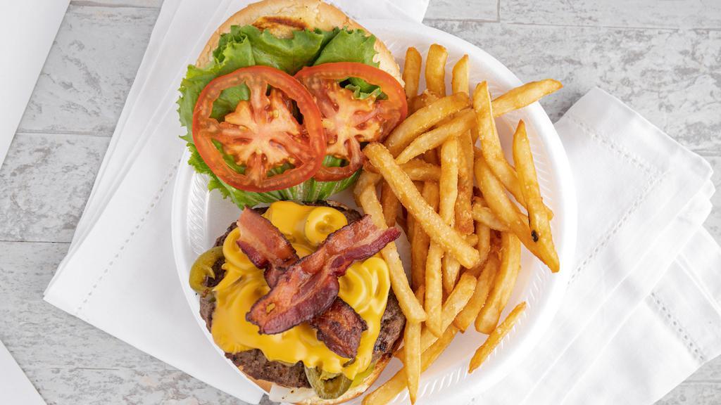 Bacon Cheeseburger Deluxe · 1/3 ib beef patty lettuce tomato mayo pickles onions American cheese and bacon