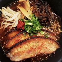 Dirty Ramen · Contains eggs and dairy. Spicy. Spicy pork broth with fermented bean curd, cha-shu pork, bea...
