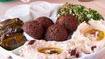Mixed Taste · It comes with baba ghanouj, hummus, four grape leaves and four falafels.