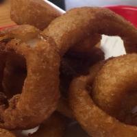 Beer Battered Onion Rings · Thick cut and beer battered onion rings.
add $2.5 for large