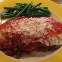 Eggplant Alla Parmigiana · thinly sliced eggplant lightly battered & baked with fresh mozzarella, topped with tomato sa...