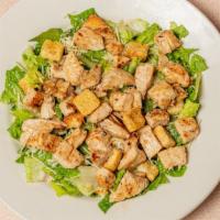 Chicken Caesar Salad · Our Caesar salad topped with grilled chicken.