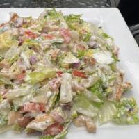 Dooley'S Chopped Salad · Mix of romaine and iceberg with tomatoes, cucumbers, red onion, grilled chicken, bacon and a...