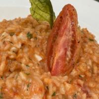 Shrimp & Crab Risotto · Gluten free. Creamy arborio rice, tender shrimp, jumbo lump crabmeat, tomato, Parmesan chees...
