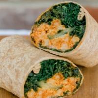 Buffalo Chk’N Kale Caesar Wrap · Kale Caesar Salad with cucumbers and onions, wrapped up with chk'n and house-made buffalo sa...