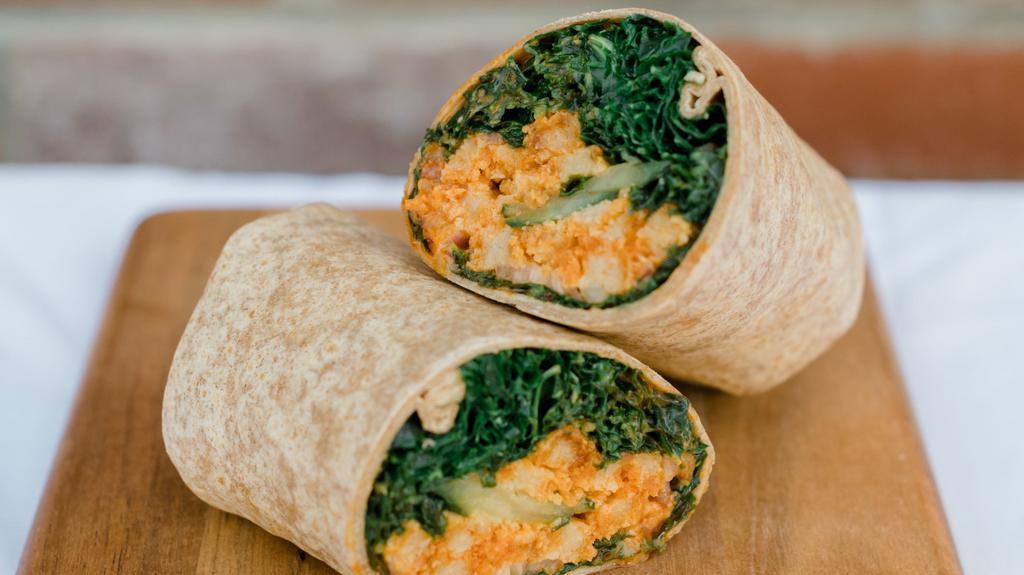 Buffalo Chk’N Kale Caesar Wrap · Kale Caesar Salad with cucumbers and onions, wrapped up with chk'n and house-made buffalo sauce. Try adding avocado!! ALLERGENS: WHEAT, SOY