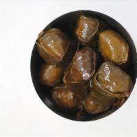 Grape Leaves (6Pc) · Aromatic rice and herbs wrapped in grape leaves and marinated in light olive oil and lemon. ...