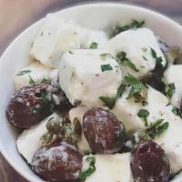 Marinated Feta + Olives (16Oz) · Creamy Vegan Feta, Kalamata Olives, Capers and Fresh Herbs tossed in a light olive oil and l...