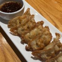 Fried Gyoza · Pork and vegetable dumplings.