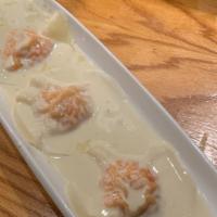 Lobster Ravioli Appetizer · Homemade lobster mousse served with our lobster creme  sauce.