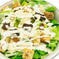 Caesar · chopped romaine, shaved parmesan cheese, garlic rosemary breadcrumbs paired with our house-m...