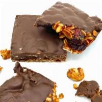 Dark Chocolate Granola Squares · gluten free oats, pecans, protein-packed almonds, diced cranberries, sweetened with local ho...