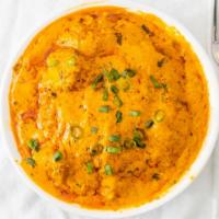 Chicken Tikka Masala · Boneless chicken cubes marinated and broiled in tandoor and cooked in a mild tomato and crea...