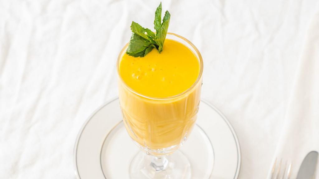 Mango Lassi  · A Refreshing Cold Drink Made From Mango, Yogurt and Sugar.