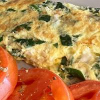 Spinach And Feta Omelette · Mixed in omelette with fresh spinach and feta cheese.