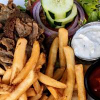 Gyro Meritha · Sliced beef and pork over grilled pita bread, cucumbers, tomatoes, onions, lettuce, fries, a...