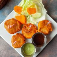 Aloo Tikki · Deep fried spiced potato patties.