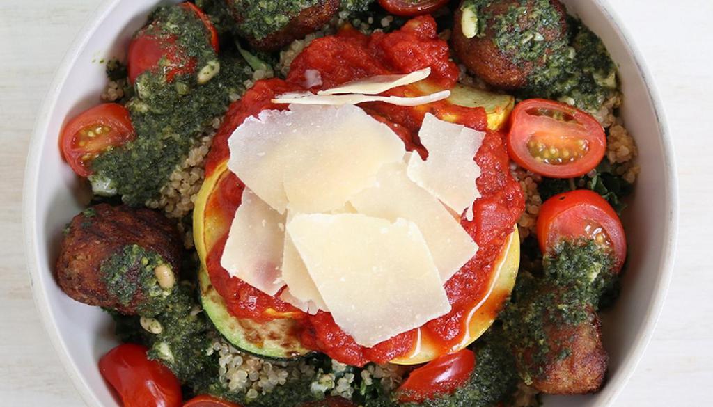 The Tuscan · marinated kale, quinoa, eggplant meatballs, sautéed zucchini, grape tomatoes, parmesan, marinara, pine nut pesto (cal: 645) - Vegetarian - Allergens: Dairy, Wheat, Soy, Tree Nuts