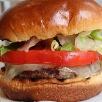 Kids Cheeseburger Meal · beef, cheddar cheese, lettuce, tomato (cal: 490) served with carrots (cal: 23), a choice of ...